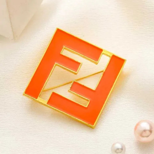 Designer-Inspired "FF" Orange Enamel Brooch