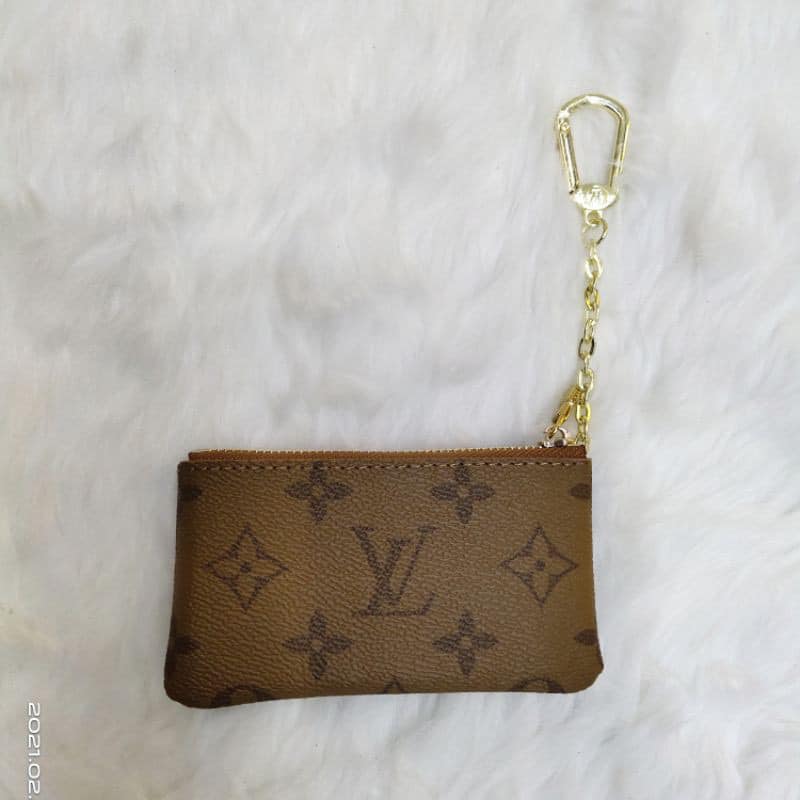 The Monogram Mini Zip Purse – Signature Brown